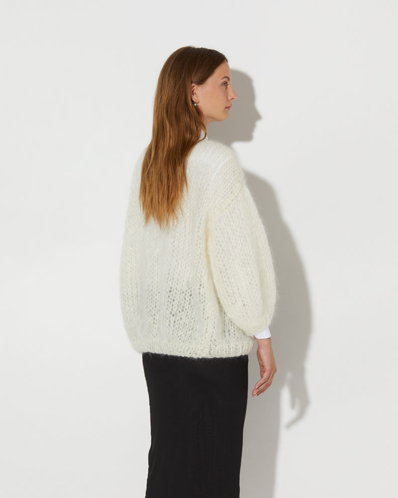 Back view from Maiami oversized Mohair Cardigan in Creme.