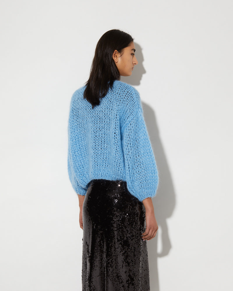 Back view of Maiami Mohair cardigan in alaskan blue.