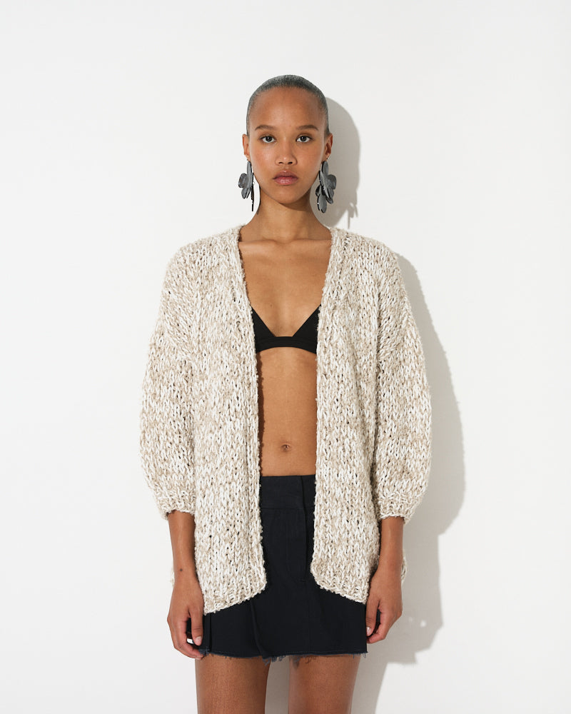 Model wearing oversized melange bouclé cardigan with belt, by Maiami, Spring 2025