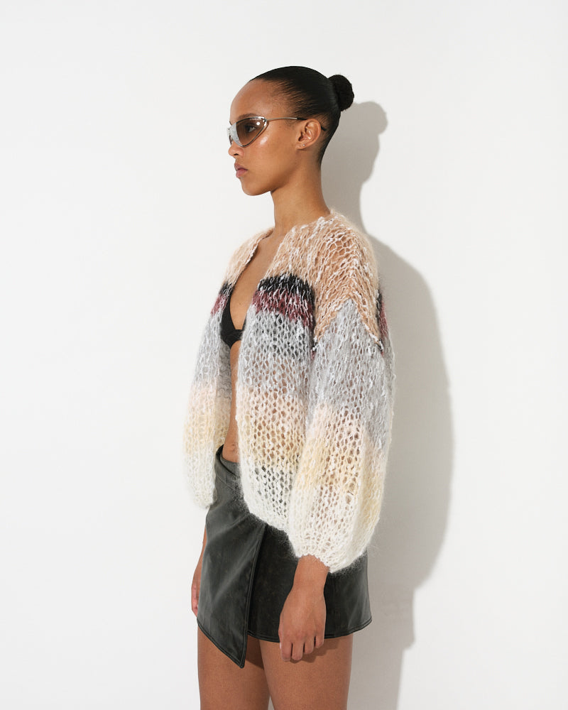 Model wearing striped bouclé bomber jacket with textured knit, by Maiami, Spring 2025