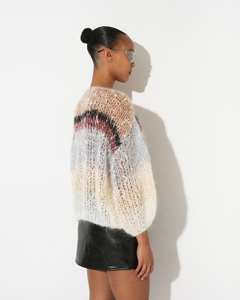 Model wearing striped bouclé bomber jacket with textured knit, by Maiami, Spring 2025