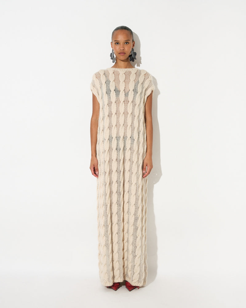 Model wearing lightweight cable knit cotton mohair dress by Maiami, Spring 2025