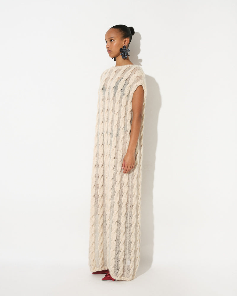 Model wearing lightweight cable knit cotton mohair dress by Maiami, Spring 2025