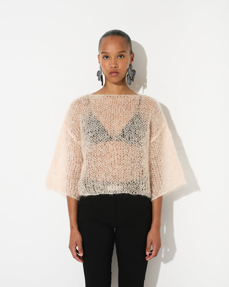 Model wearing plain light mohair t-shirt with minimalist fit by Maiami, Spring 2025