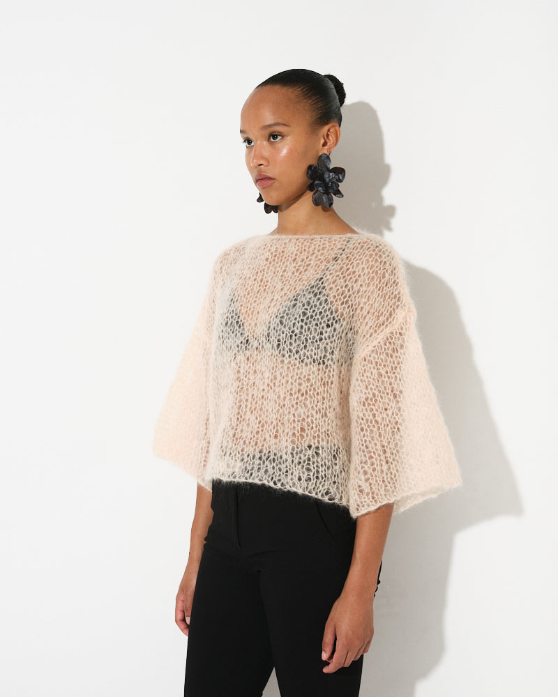 Model wearing plain light mohair t-shirt with minimalist fit by Maiami, Spring 2025