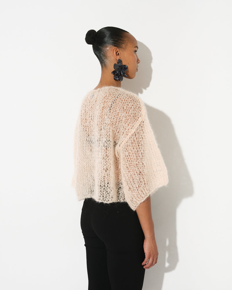 Model wearing plain light mohair t-shirt with minimalist fit by Maiami, Spring 2025