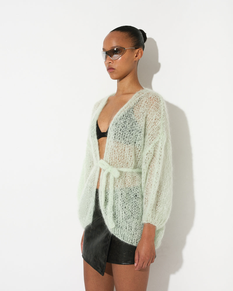 Model wearing oversized lightweight mohair cardigan by Maiami, Spring 2025