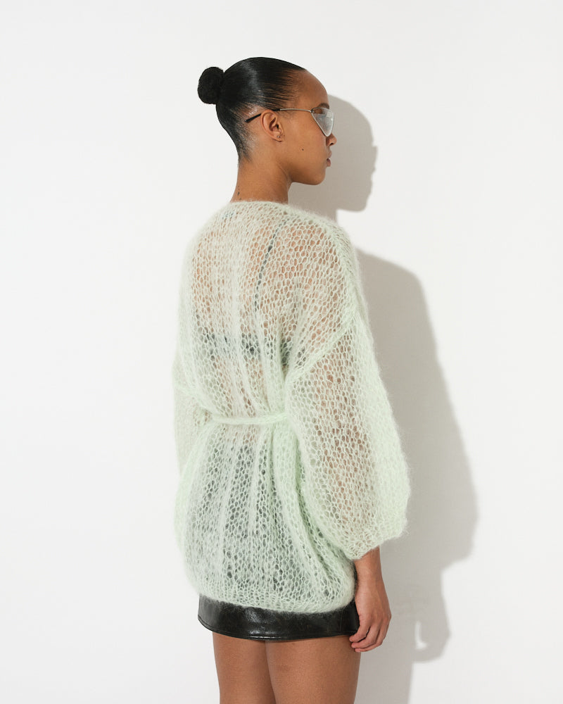 Model wearing oversized lightweight mohair cardigan by Maiami, Spring 2025