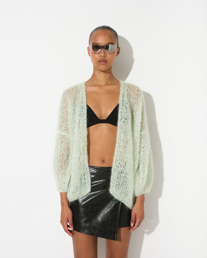 Model wearing oversized lightweight mohair cardigan by Maiami, Spring 2025