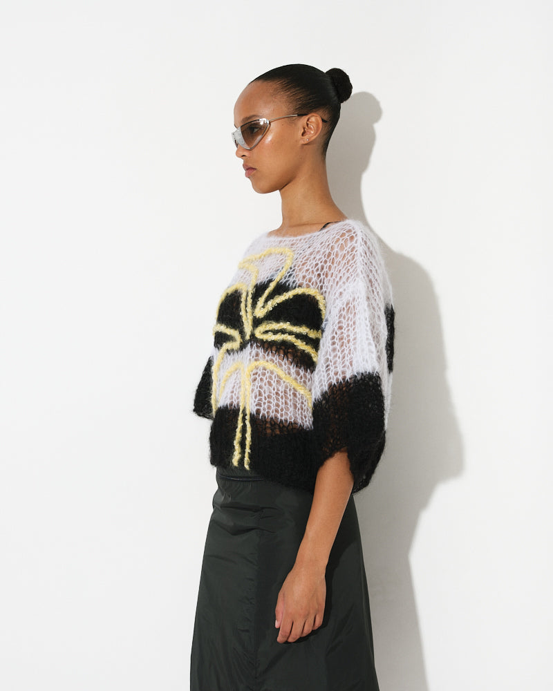 Model wearing palm tree embroidered light mohair t-shirt by Maiami, Spring 2025