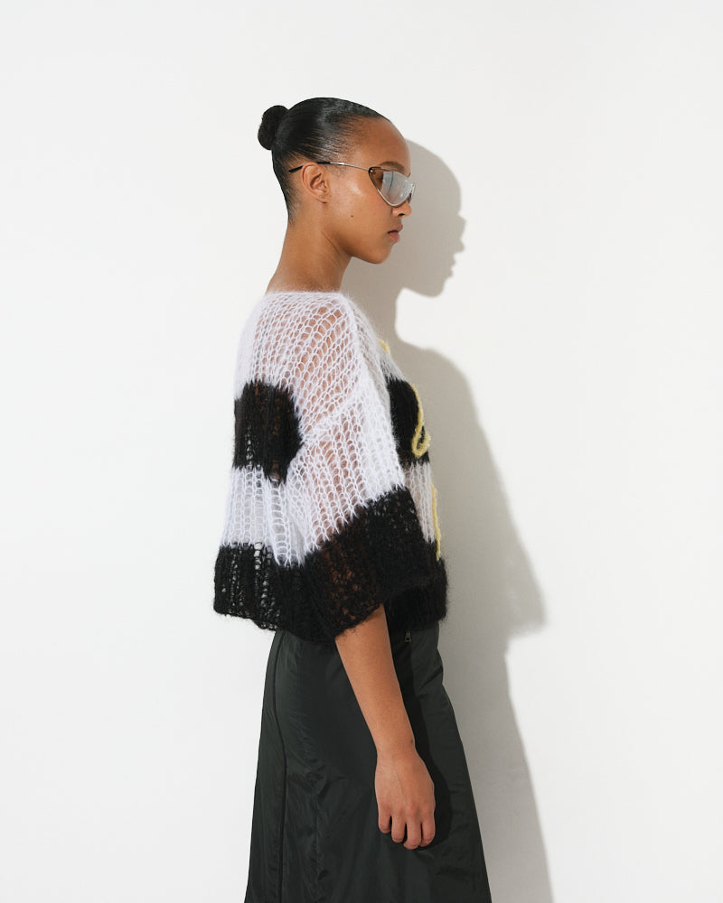 Model wearing palm tree embroidered light mohair t-shirt by Maiami, Spring 2025