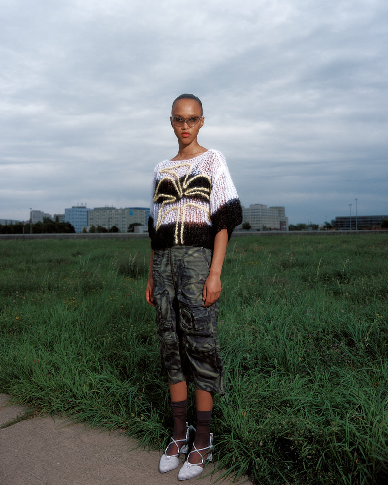 Model wearing palm tree embroidered light mohair t-shirt by Maiami, Spring 2025