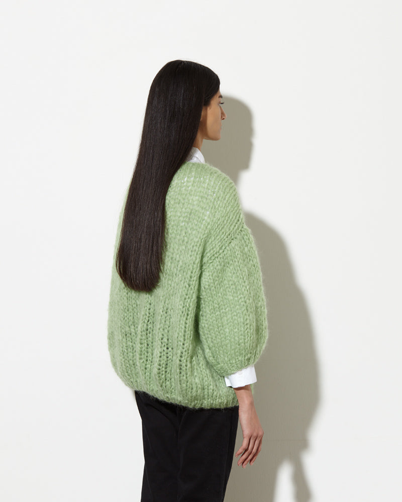 Back view from Maiami Big Cardigan. Made from Mohair in pistachio.
