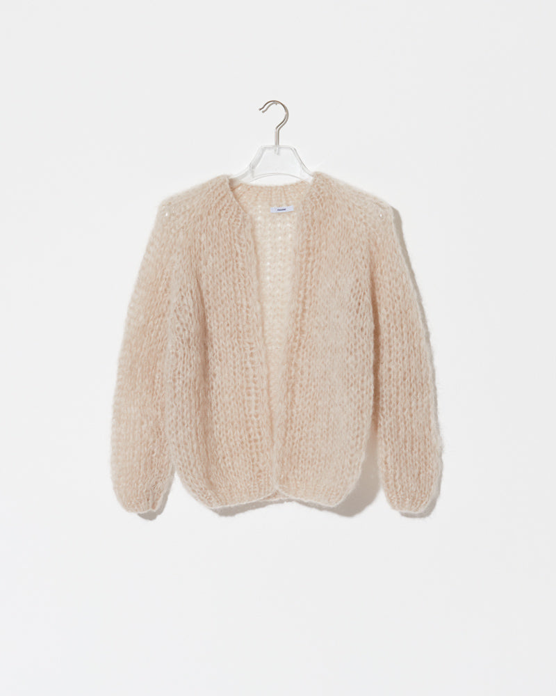 Small Cardigan in beige.