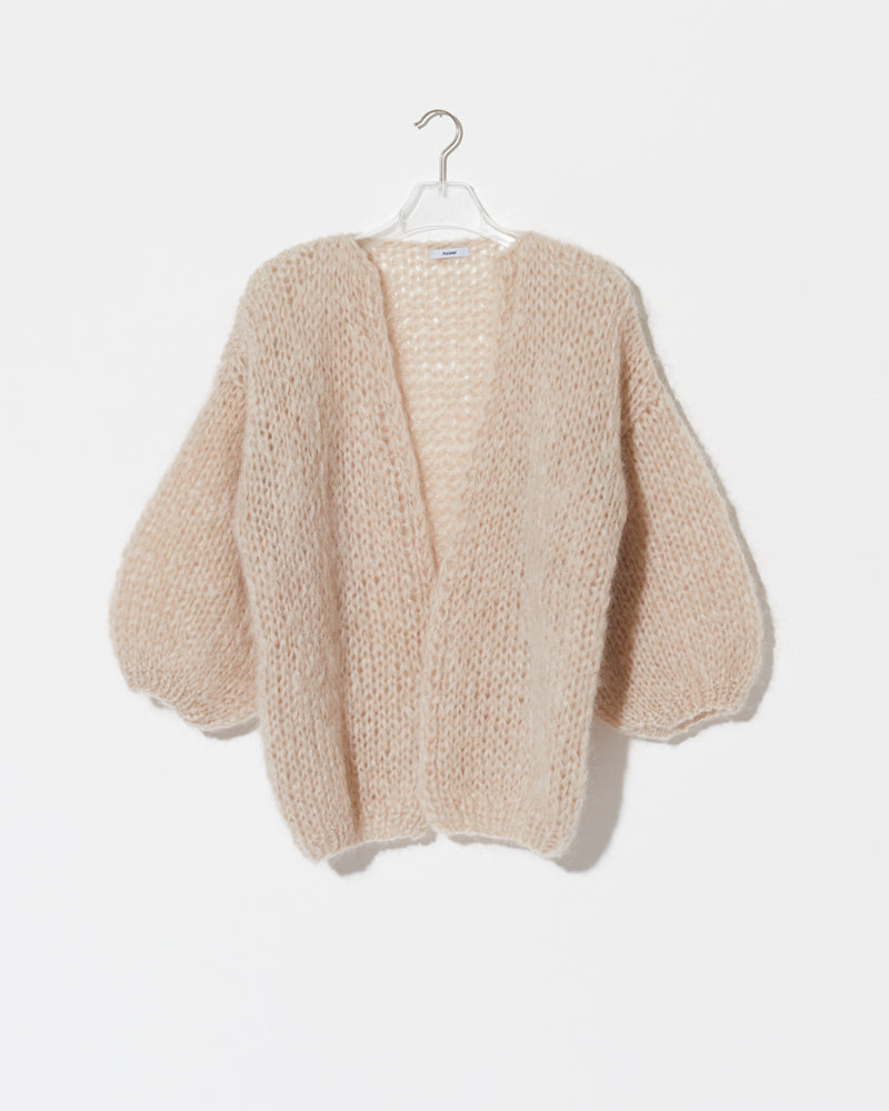 Oversized cardigan in beige.