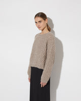 View from the side of model wearing the new in Alpaca Brioche Pullover in the color 'Greige ZQ03'