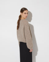 View from the back of model wearing the new in Alpaca Brioche Pullover in the color 'Greige ZQ03'