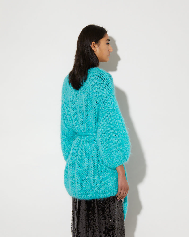 Back view of Maiami Alpaca cardigan in mint green.