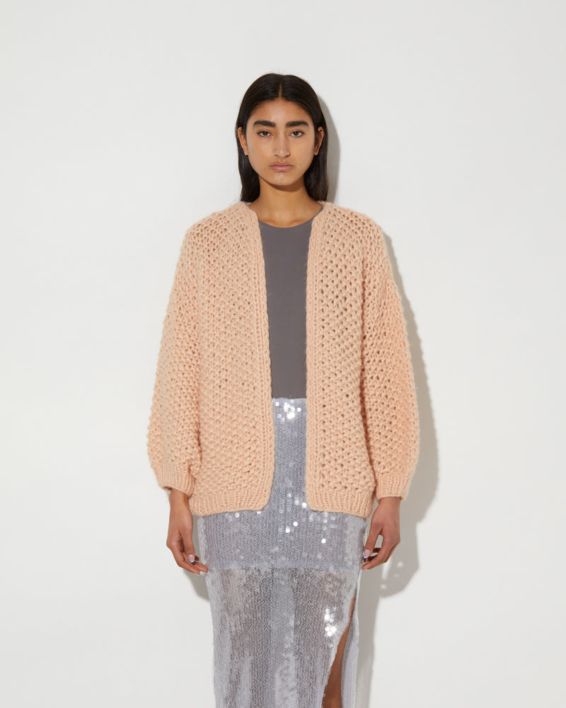 Maiami knitwear. Hand-knitted cardigan in Apricot.