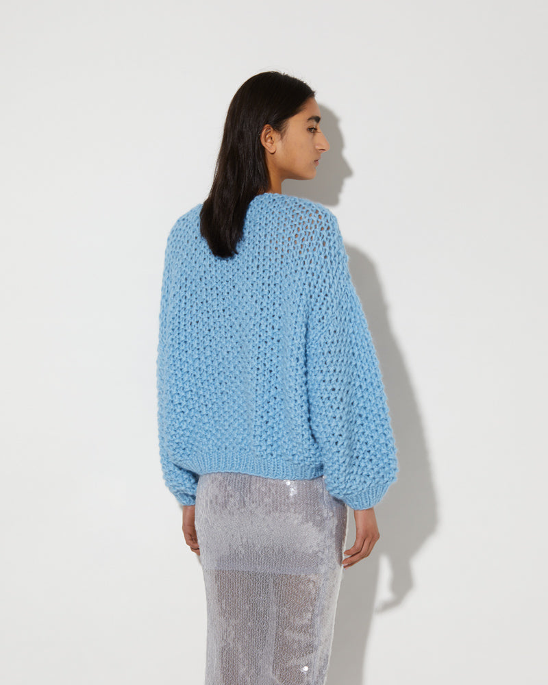 Maiami Bomber Cardigan, knitted in Alaskan Blue.