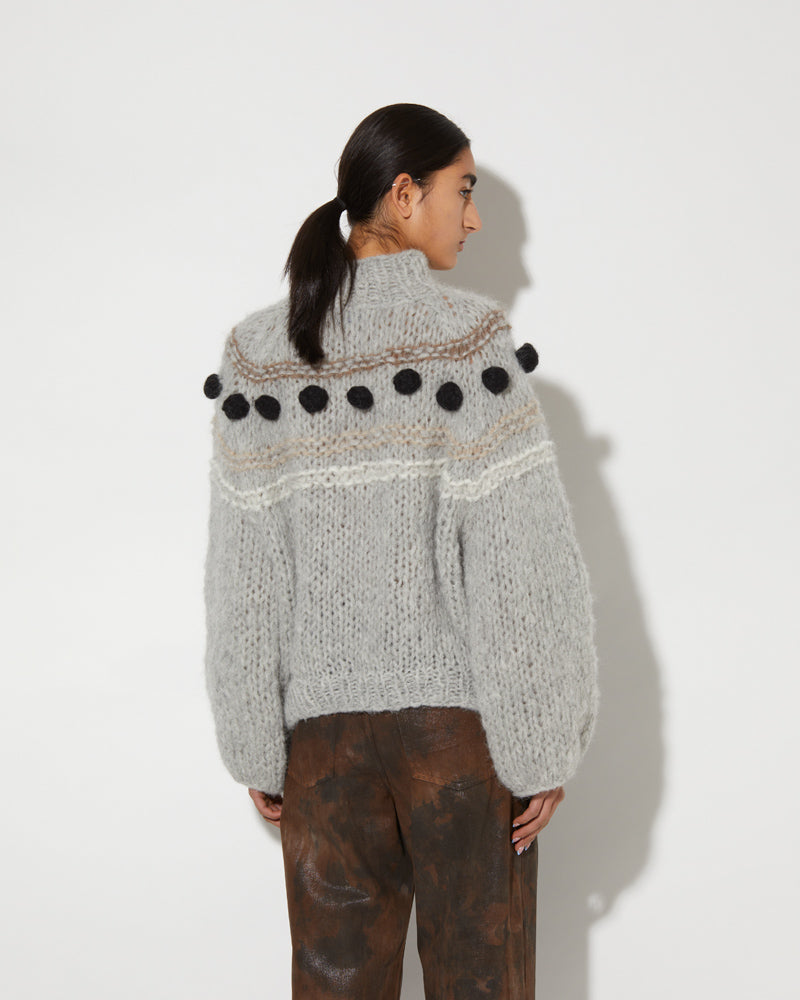 Back view of Maiami knitted Alpaca sweater with black bobbles.