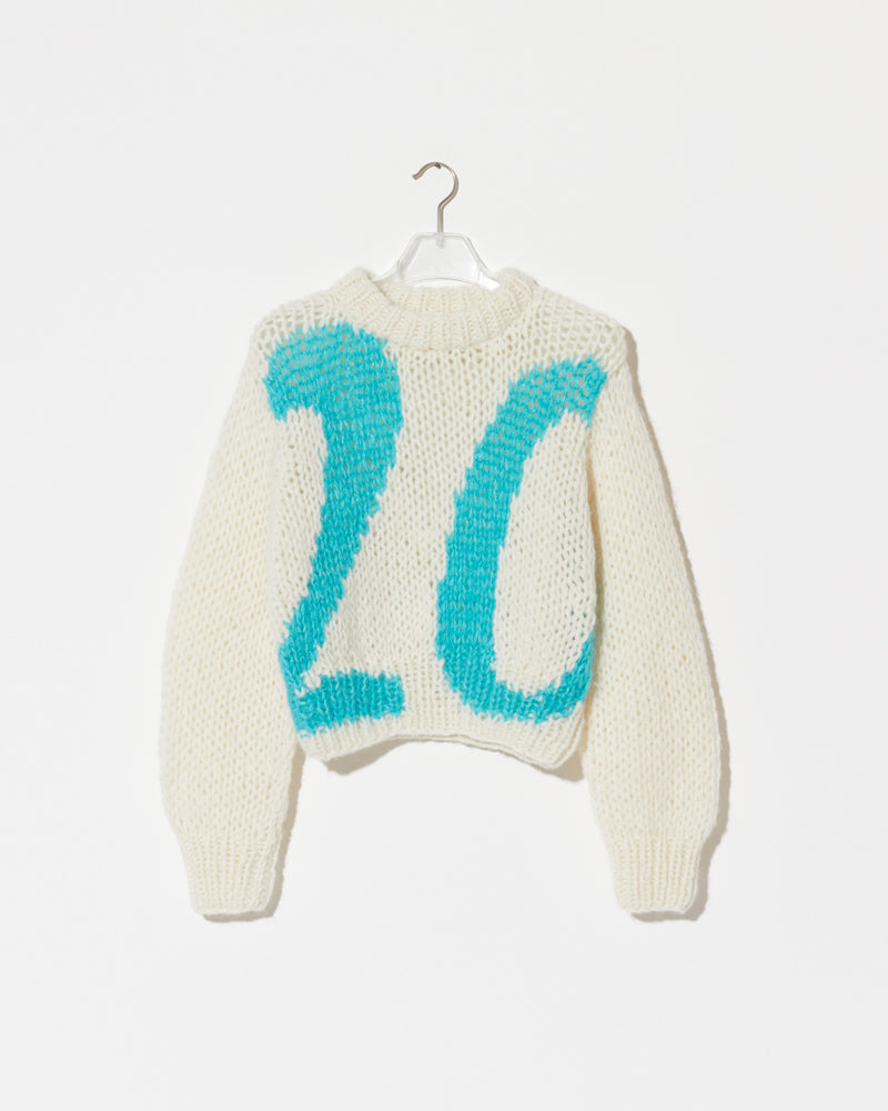 Maiami Alpaca Pullover in white. The number 20 in mint on the front.