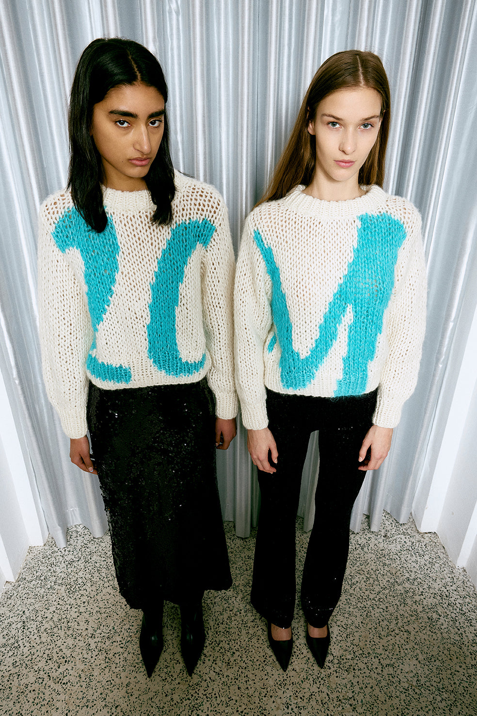 Maiami Alpaca sweaters with number 20 or letter M in the front.