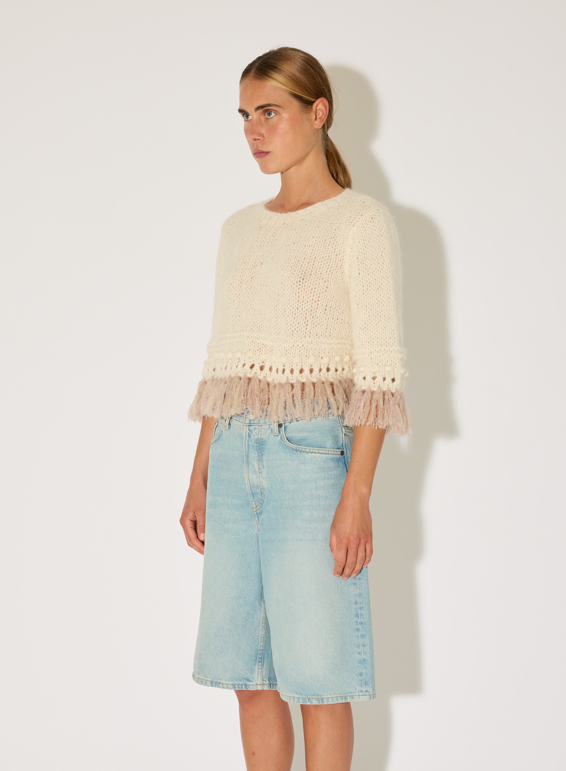 alpaca knit top with fringe hem Maiami