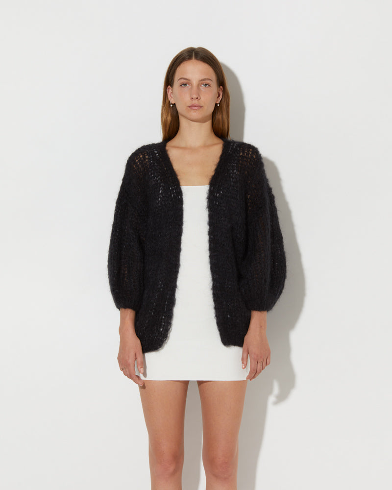 Frontal view of Model wearing the Mohair Oversized Cardigan Light. Mohair knit cardigan women.