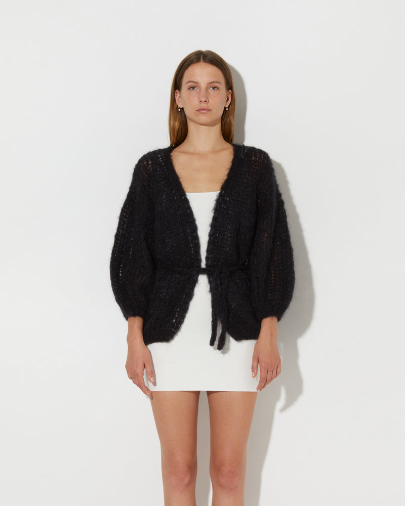 Frontal view of Model wearing the Mohair Oversized Cardigan Light. Mohair knit cardigan women
