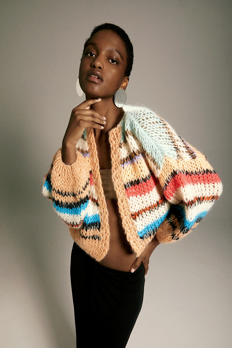 Frontal view of Model wearing the Stripes Galore Bomber Cardigan. Mohair cardigan womens.