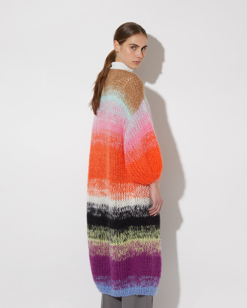 View from the back of model wearing the Gradient Fade Mohair Coat in the color 'Cool Pastels'