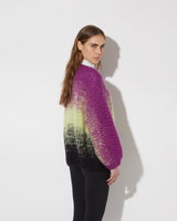 View from the back of model wearing the new in Gradient Fade Mohair Cardigan in the color 'Cool Pastels GFBC'