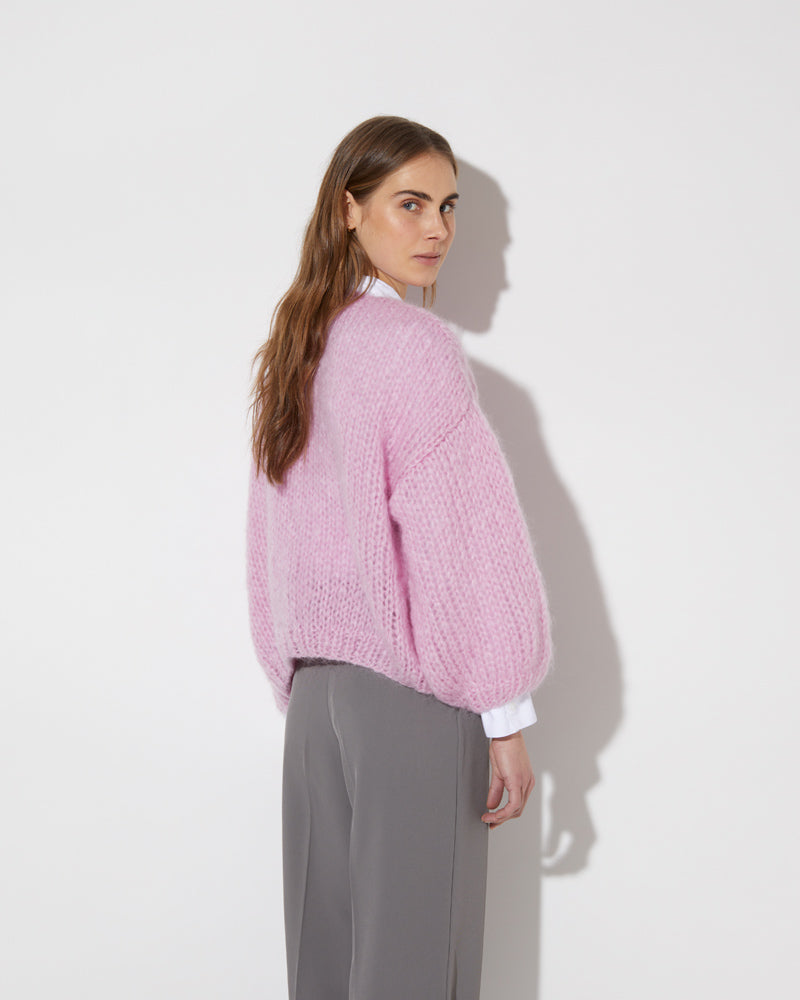 View from the back of model wearing the new in Mohair Big Bomber Cardigan in the new color 'Rose 28'