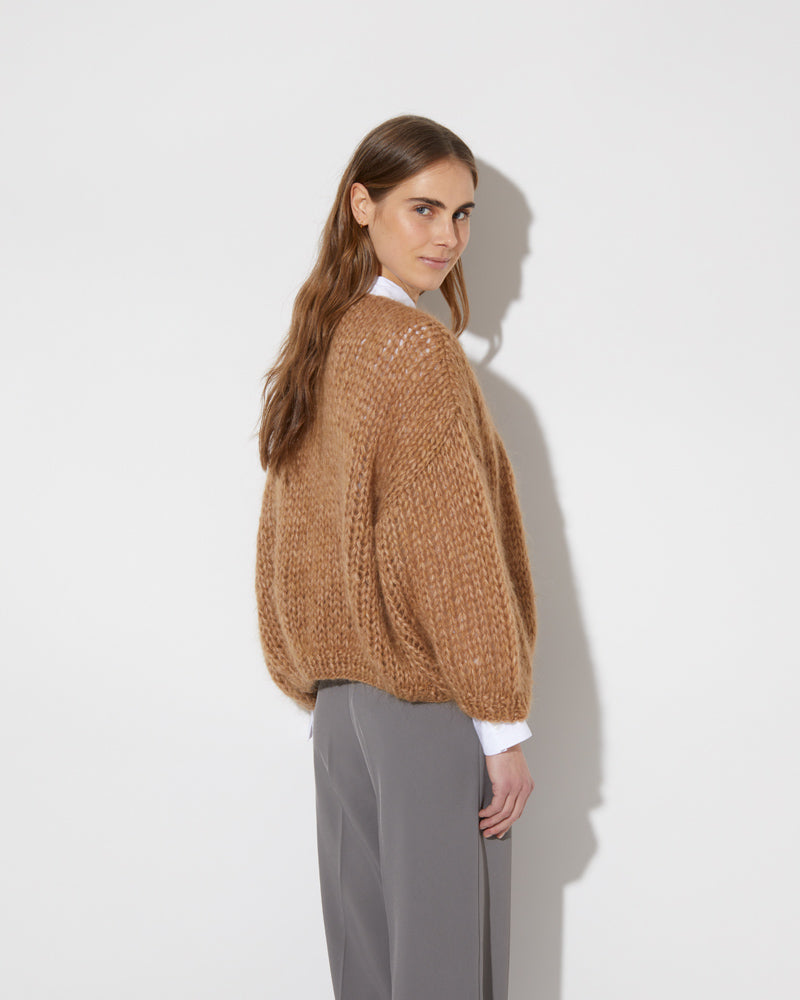 View from the back of model wearing the new in Mohair Big Bomber Cardigan in the new color 'Sahara 8014'