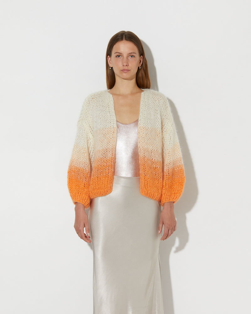 Frontal view of Model wearing the Mohair Bomber Cardigan Ombre. Mohair cardigan sweater.