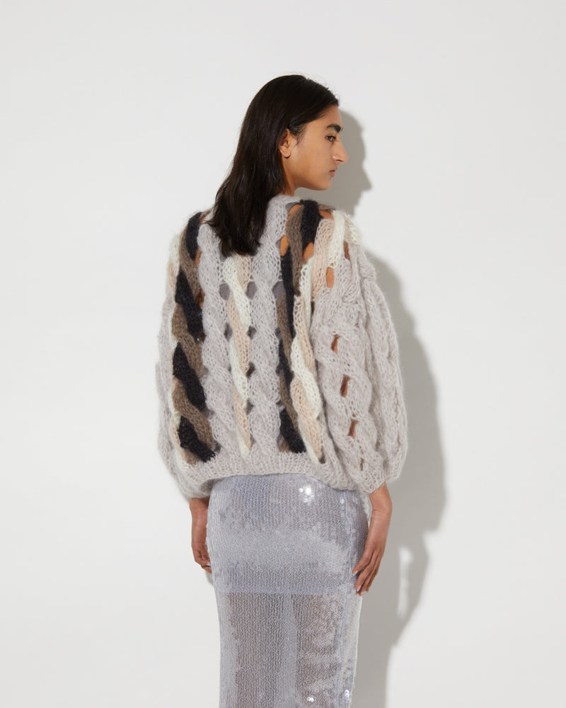 Back view of hand-knitted cardigan from Maiami. Made from Mohair.