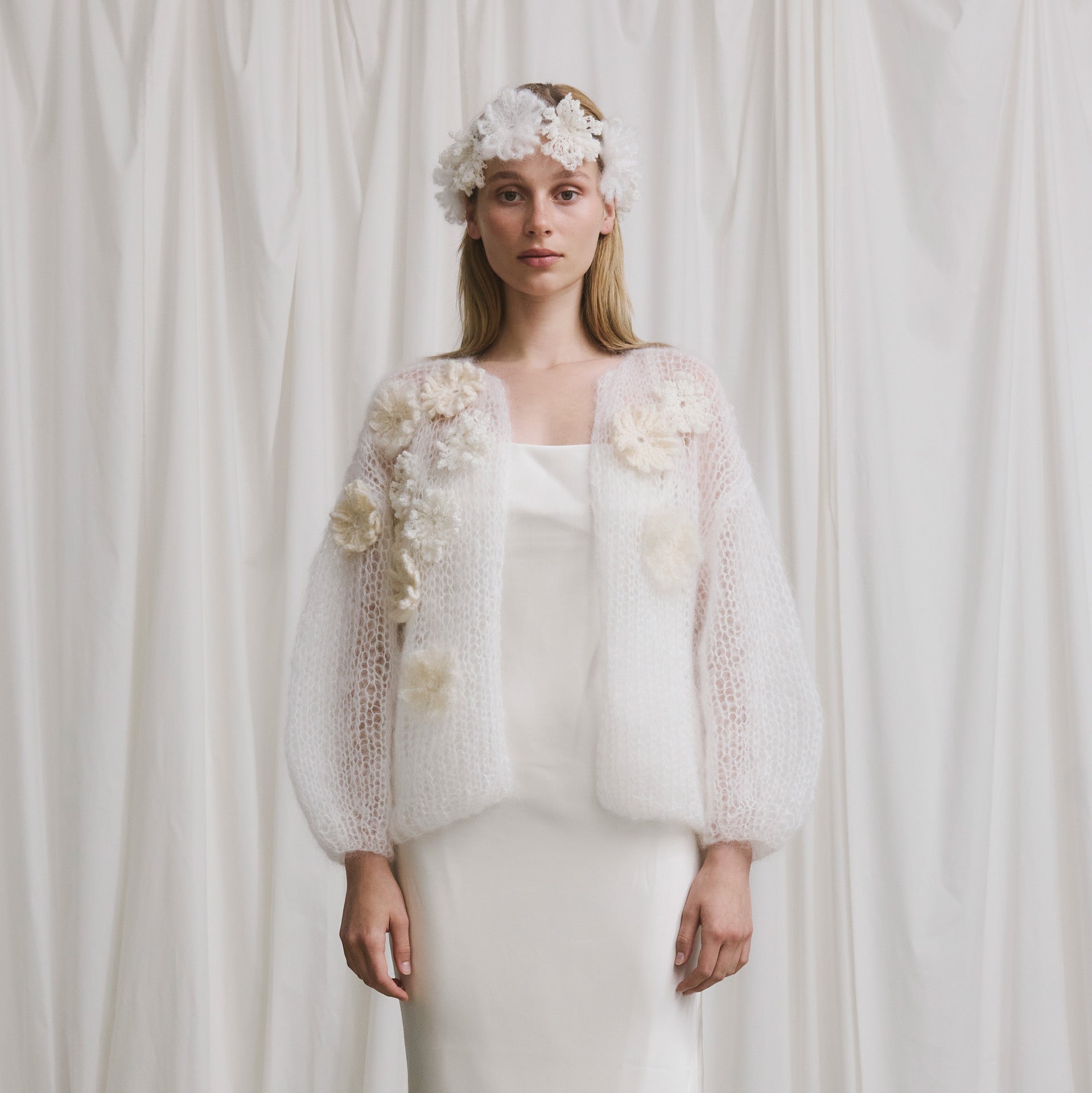 Maiami bridal knitwear layered over a minimalist wedding dress