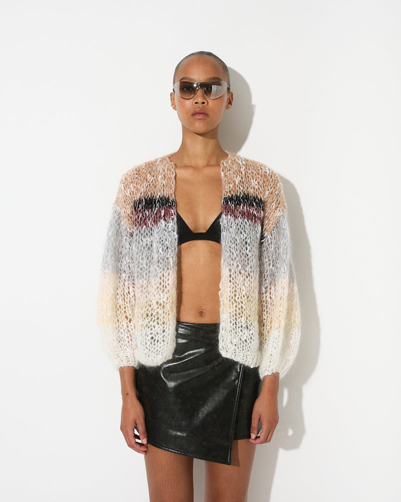 Model wearing striped bouclé bomber jacket with textured knit, by Maiami, Spring 2025
