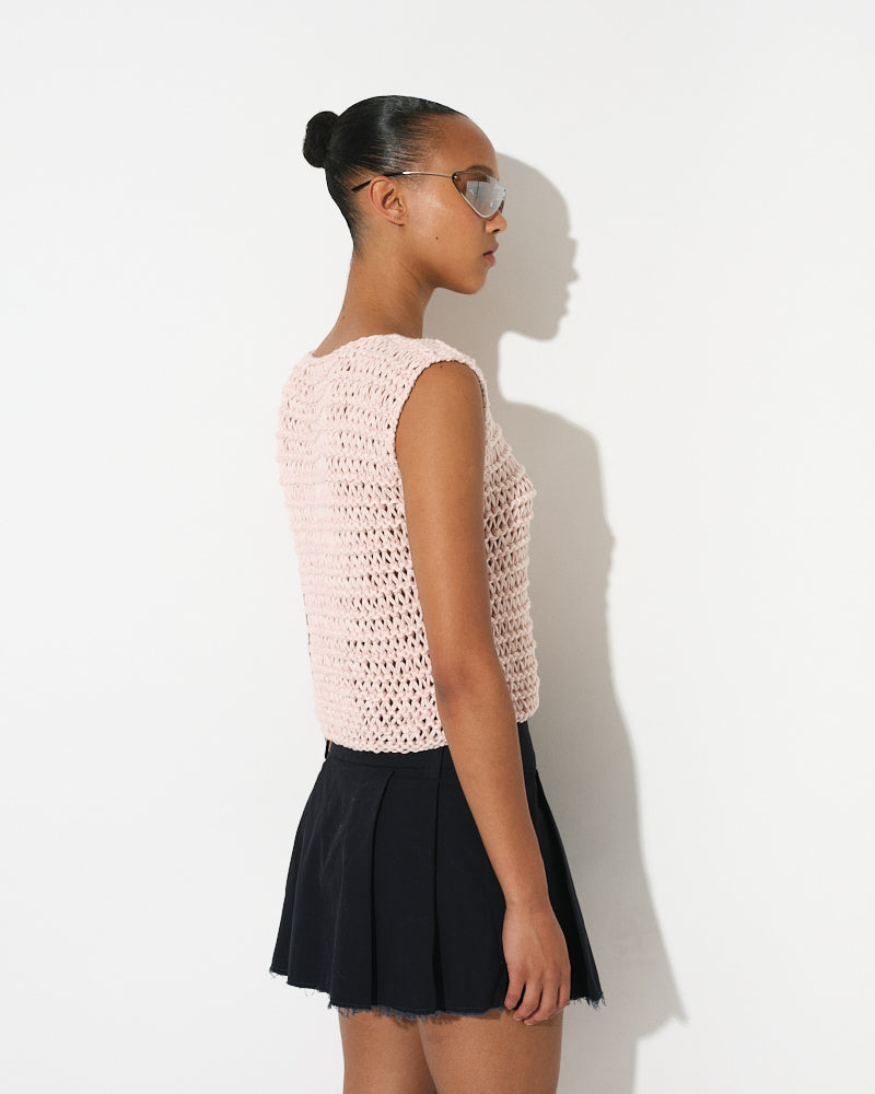 Model wearing sleeveless dropstitch cotton knit top by Maiami, Spring 2025