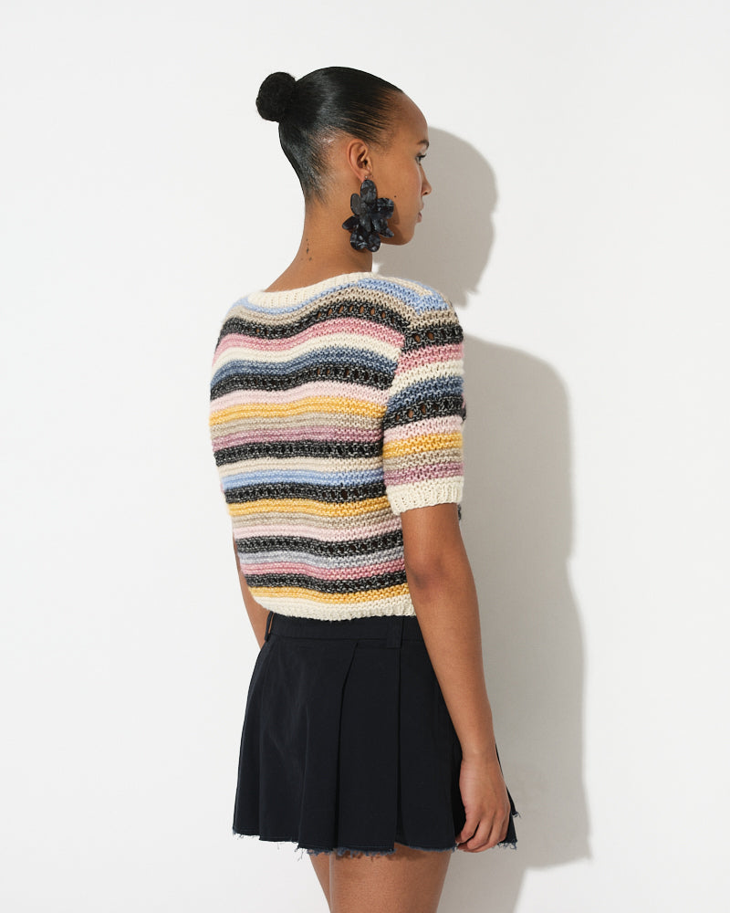 Model wearing striped t-shirt in cotton merino blend by Maiami, Spring 2025