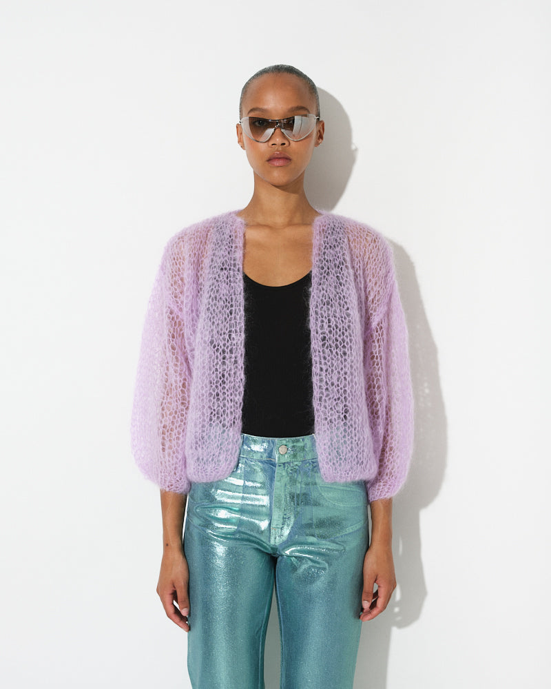 Model wearing light mohair bomber cardigan with spring stripes by Maiami, Spring 2025