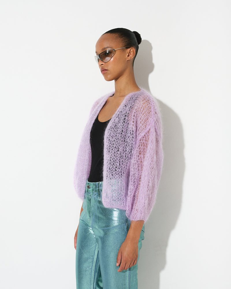 Model wearing light mohair bomber cardigan with spring stripes by Maiami, Spring 2025