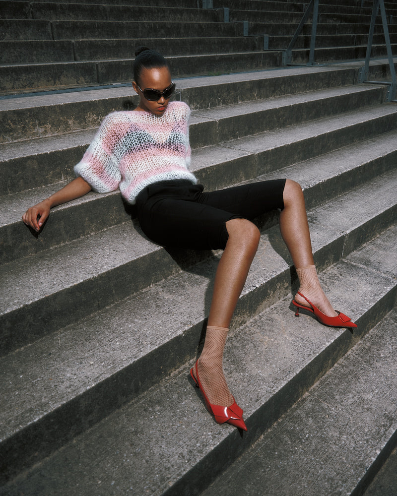 Model wearing striped mohair top with puffy sleeves by Maiami, Spring 2025