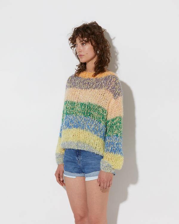model wearing the spring boucle rainbowmohair sweater in citric. Shot from the side
