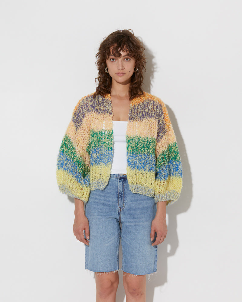 model wearing the spring boucle bomber cardigan in citric. Shot from the front