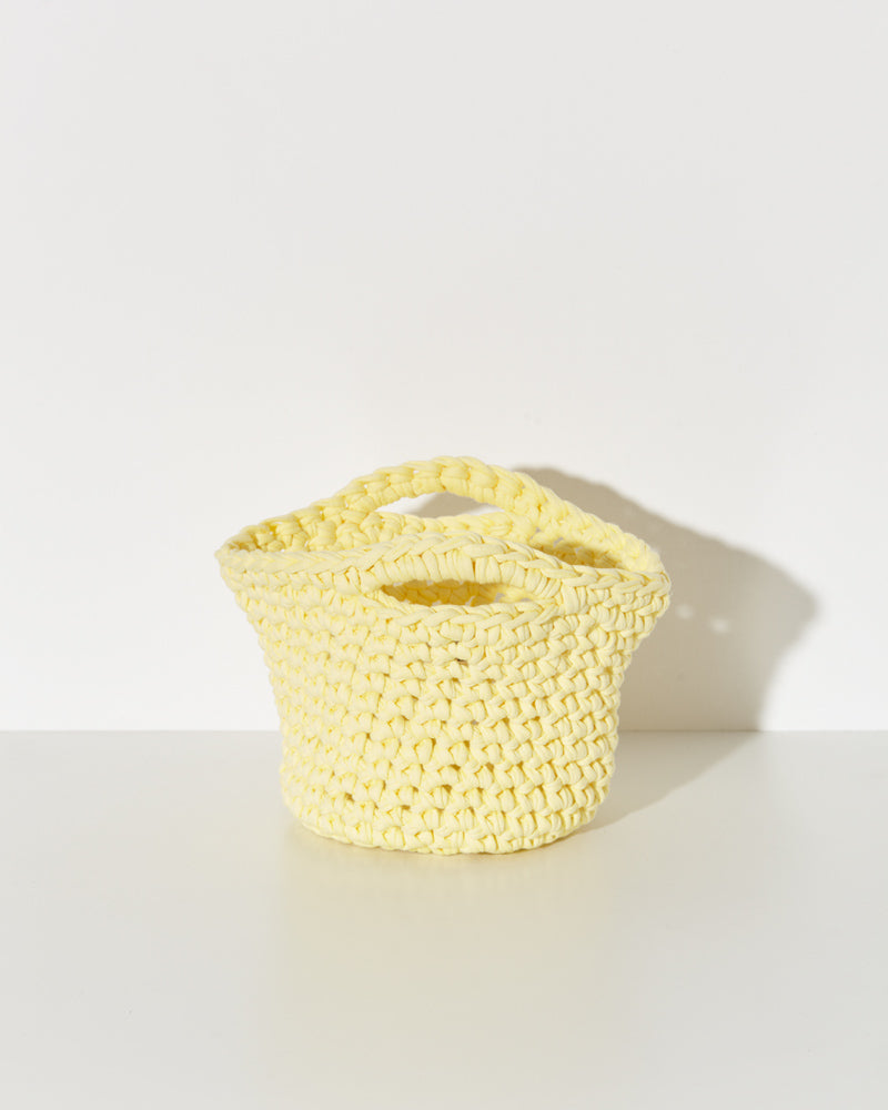 Maiami hand-knitted Hat Bag in yellow.