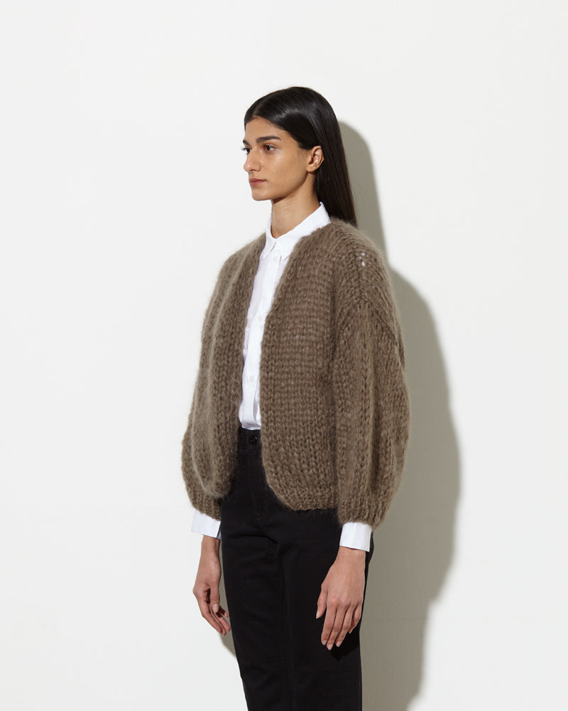 Model from the side wearing Mohair cardigan womens in brown.
