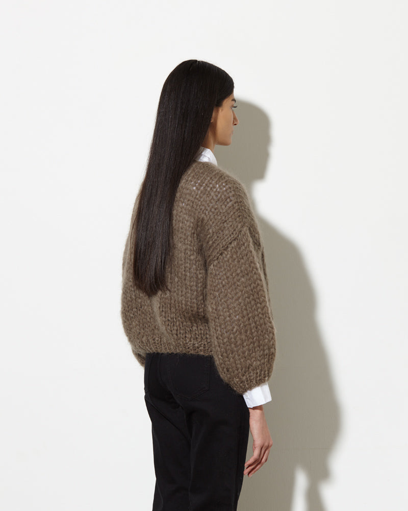 Model from the back wearing Mohair cardigan womens in brown.