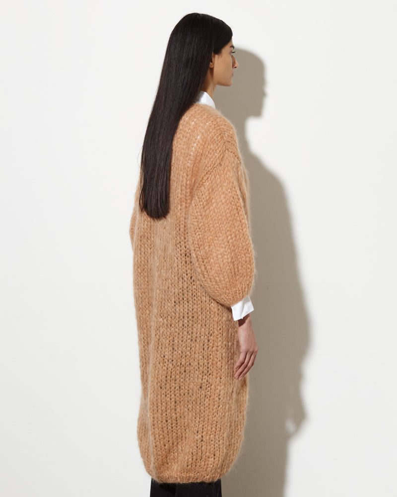 Model from the back wearing Mohair coat.